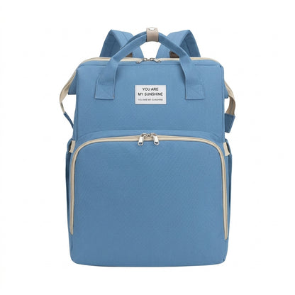 Mochila 4 en 1: cambiador, cuna y juegos